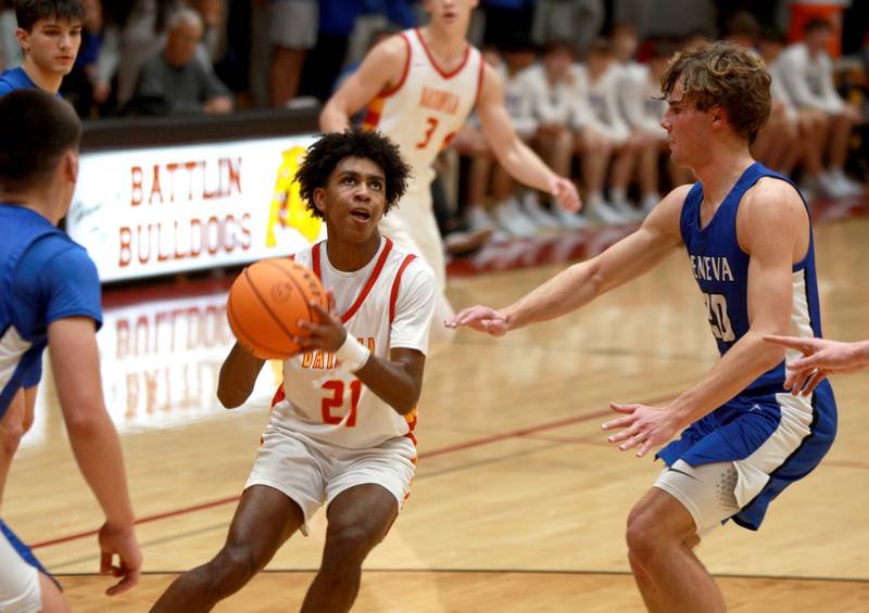 Batavia’s Xavier Justice looks for an opening during a game against Geneva on Friday, Dec. 20, 2024 in Batavia