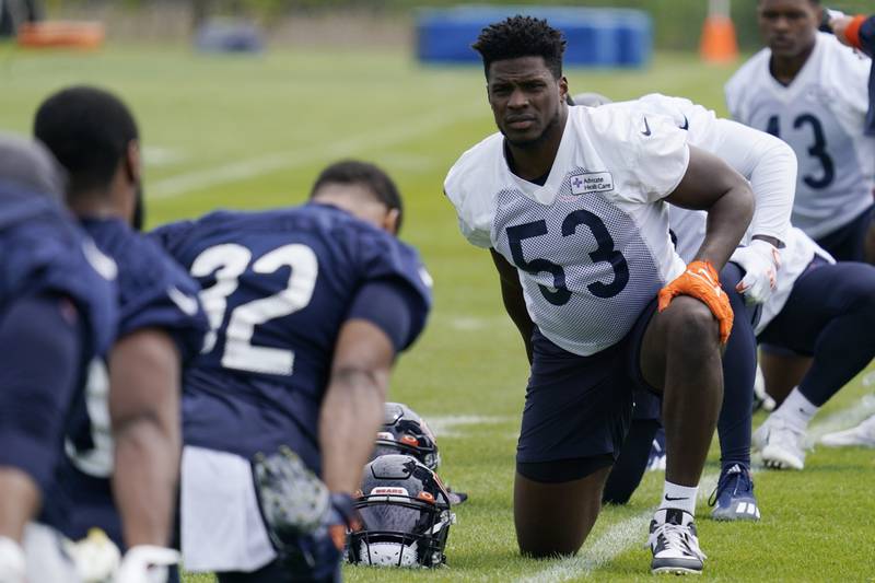 Chicago Bears linebacker Nicholas Morrow warms up with teammates at the team's practice facility, Tuesday, May 24, 2022, in Lake Forest.