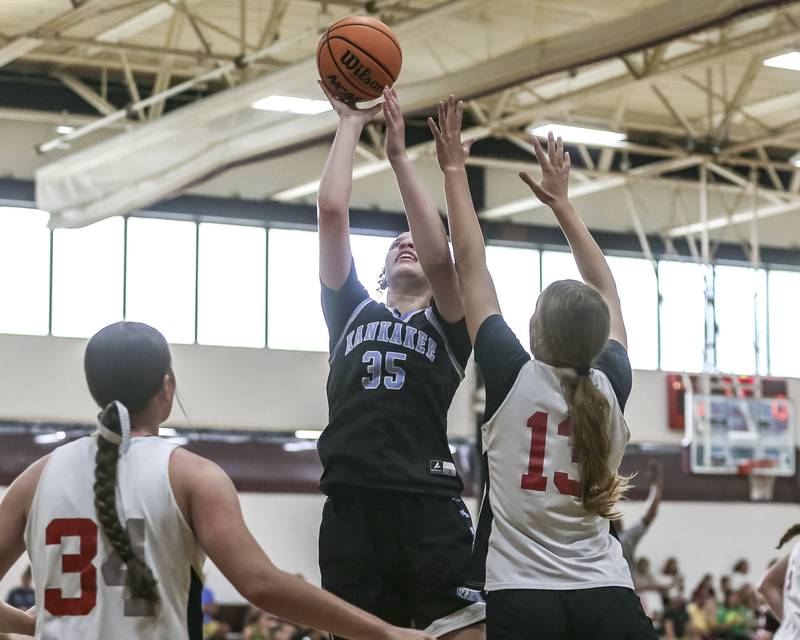 Kankakee's Ava Johnson shoots over the defense at the basekt in their Morris Shootout girls basketball game.  June 18, 2025 in Morris.