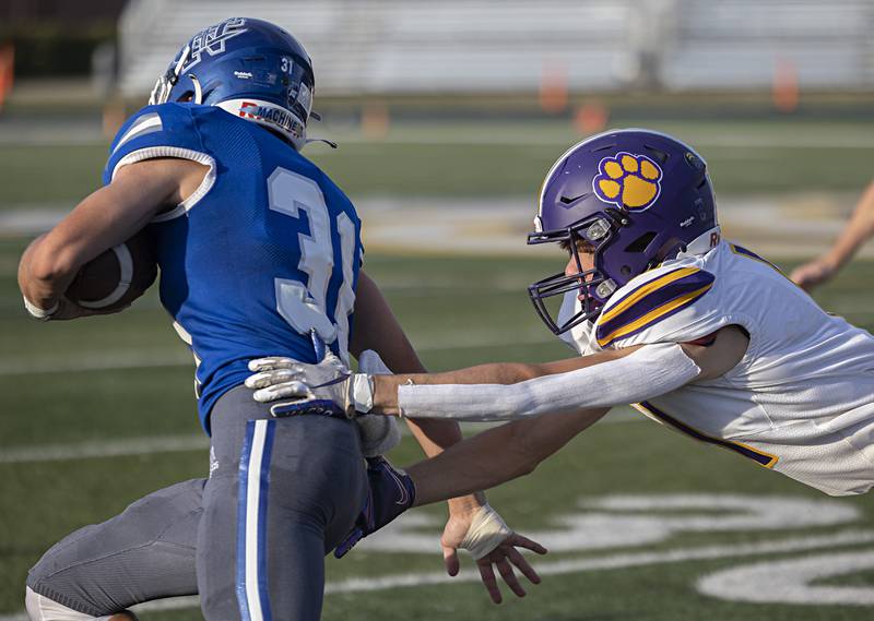 Sherrard’s Cyrus Hoke looks to tackle Newman’s Cody McBride Saturday, Sept. 2, 2023.