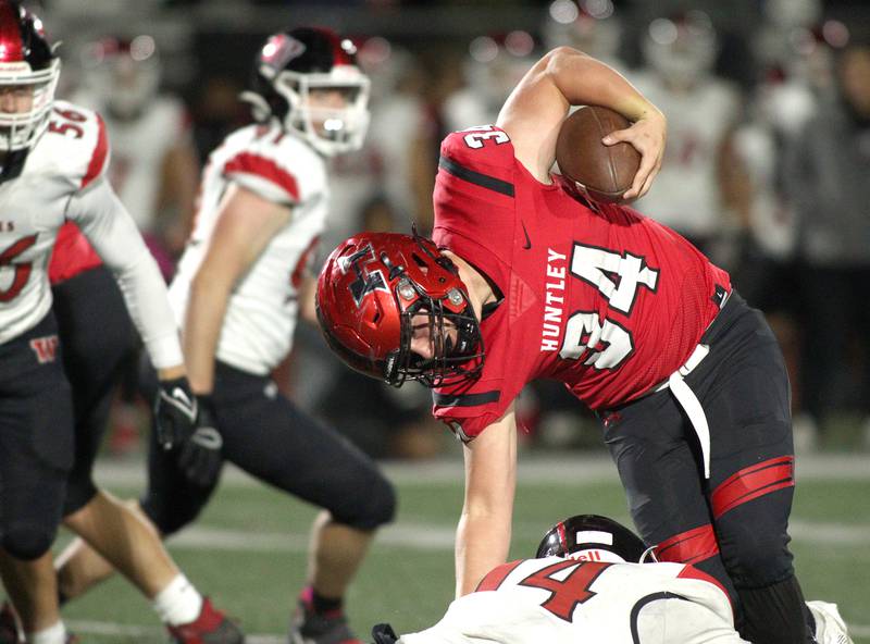 Huntley’s Haiden Janke runs the ball against Niles West in first-round Class 8A playoff football action at Huntley Friday.