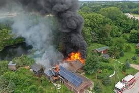 Photos: Large fire breaks out at La Salle home 