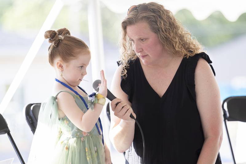 Charlotte Rippy, 5, tells her age Thursday, June 26, 2025, while being interviewed by host Jody Merrill during Polo’s Little Miss and Mister pageant.
