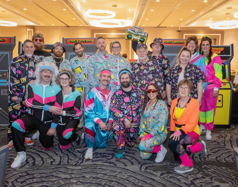 Revelers celebrate an earlier era at the McHenry Area Chamber's 2024 Gala, "Boombox Ball: A Totally Tubular '80s Party," on Jan. 27.