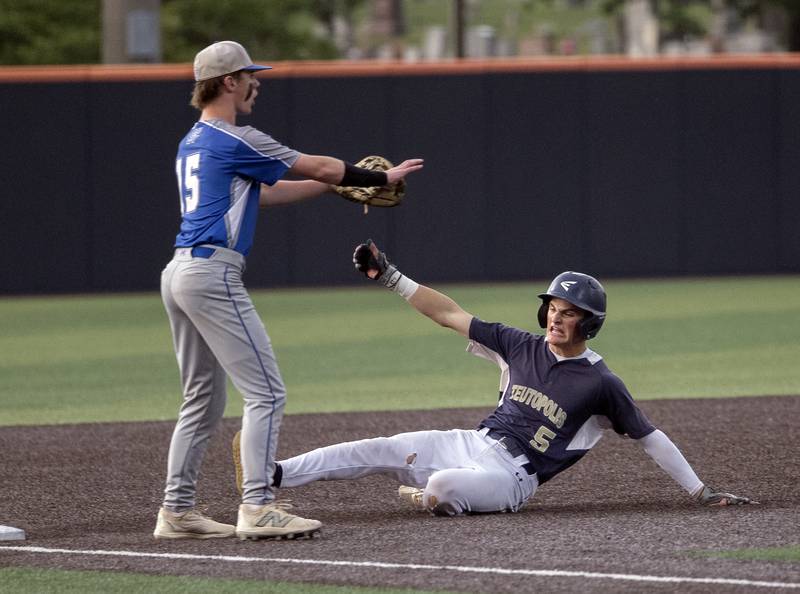 Teutopolis’ Aidan Niemerg slides in with a triple against Newman Friday, June 6, 2025, during the Class 2A state semifinal at Illinois Field in Champaign.