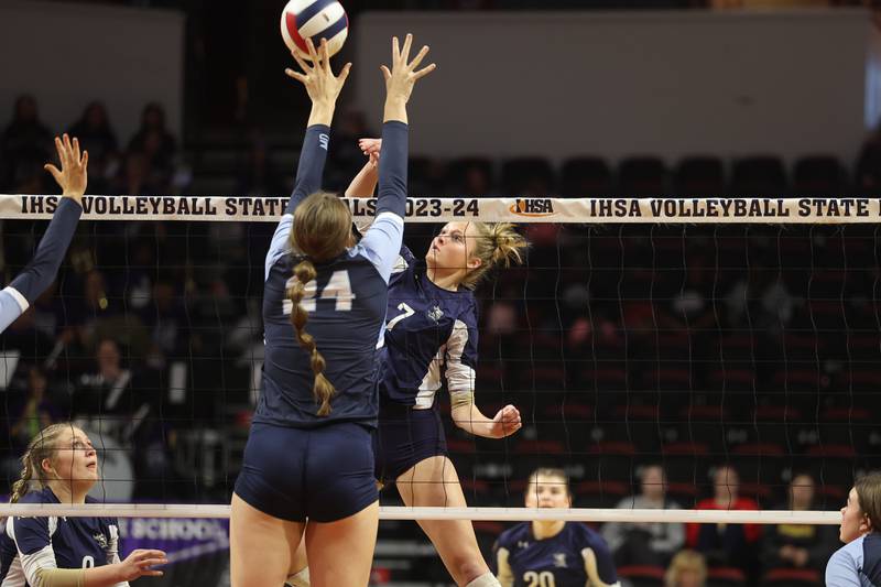 IC Catholic’s Delilah Hyland hits a shot against Mater Dei in the Class 2A Volleyball Championship match on Saturday, Nov. 11, 2023 in Normal.