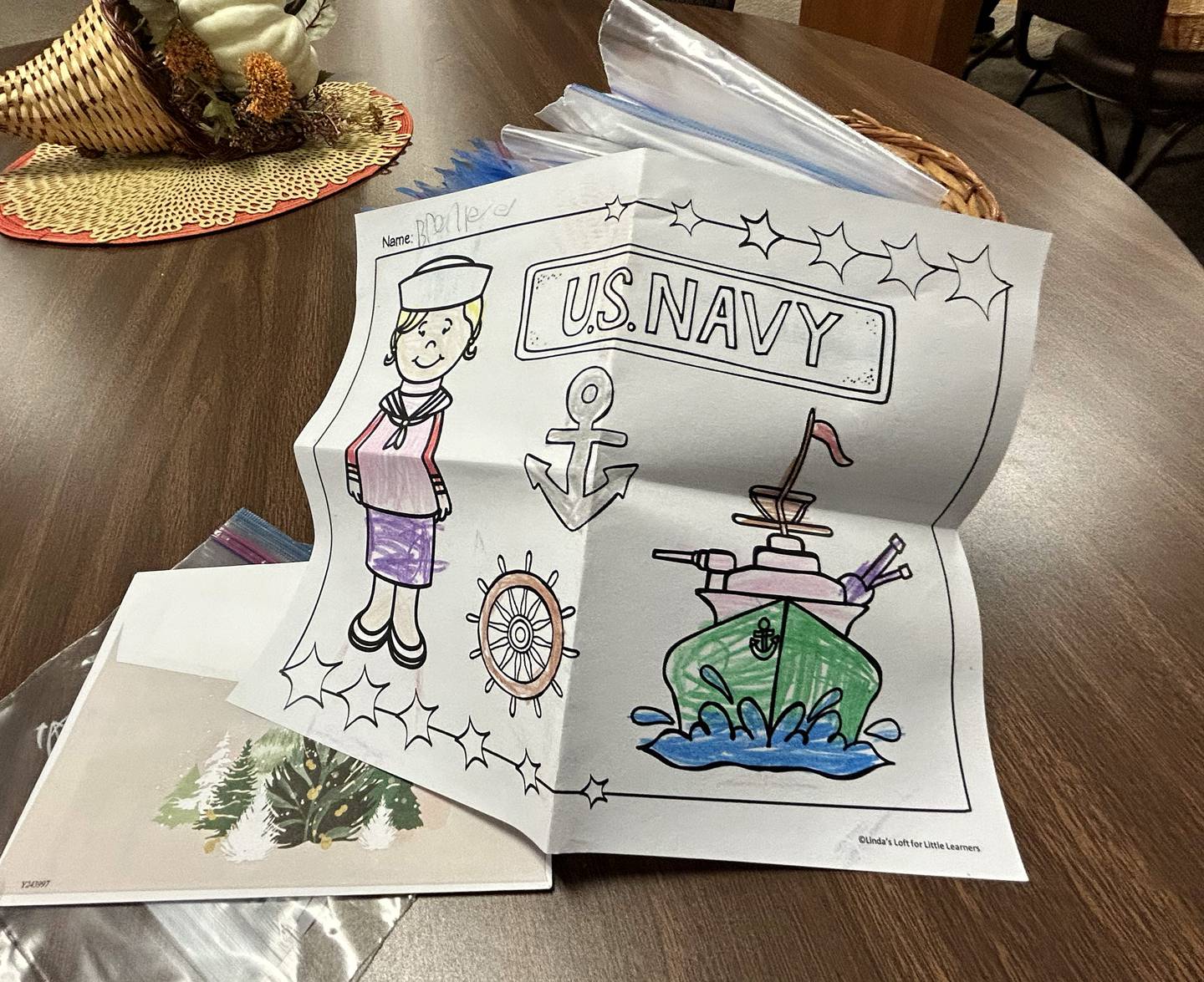 Cards and photos created by adults and children were part of care packages for sailors on the USS Fitzgerald at the Evangelical Free Church of Mt. Morris  on Thursday, Oct. 16, 2025.