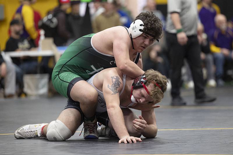 Alleman’s Jordan Thompson controls Fulton’s Mason Kuebel in the 175 pound finals Saturday, Jan. 31, 2026, during the Class 1A Wrestling Regionals at Riverdale High School.