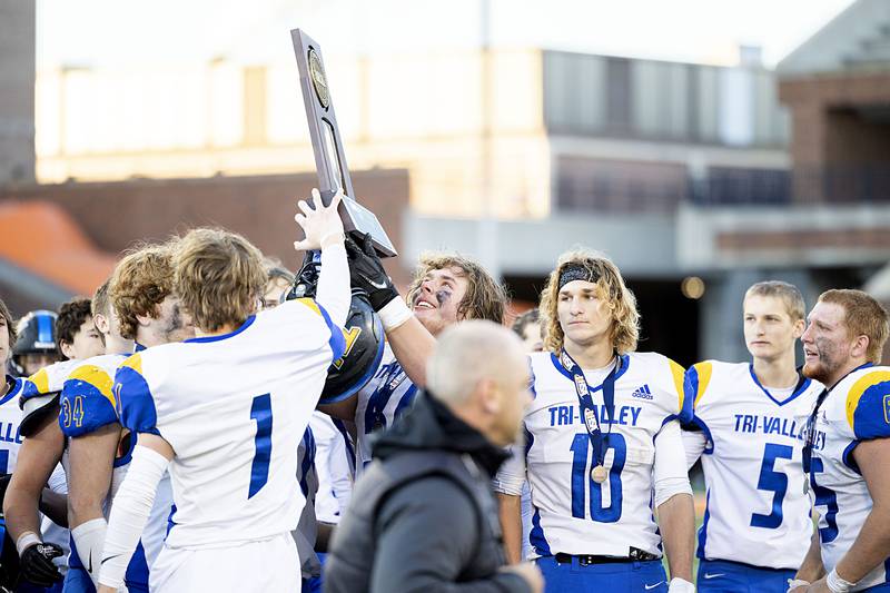 Tri-Valley lifts the second place trophy in the class 2A IHSA football state championship game Friday, Nov. 25, 2022.