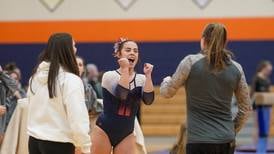 Gymnastics: Oswego co-op repeats as regional champs