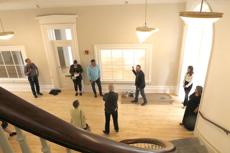 Woodstock City planner Darrell Moore talks about the newly remodeled Old Courthouse Center in Woodstock on Thursday, July 13, 2023, during a tour of the building.