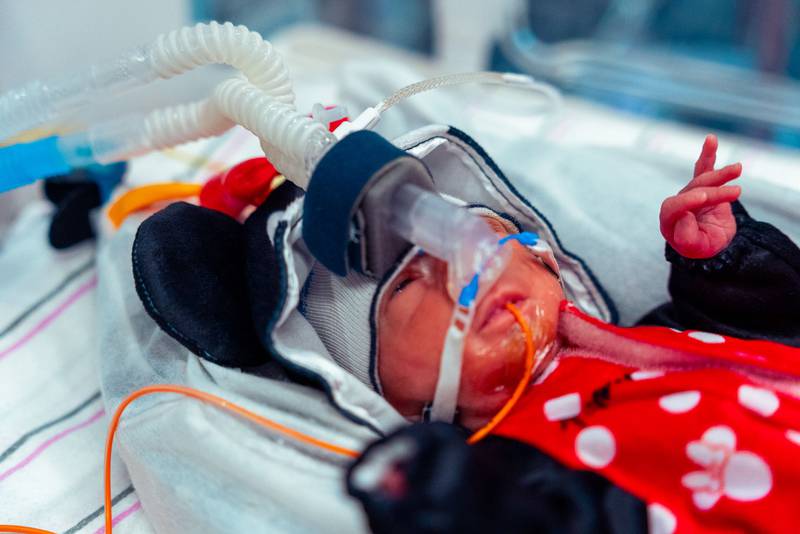 One of Minnie Mouse triplets at Silver Cross Hospital's NICU unit on Halloween 2025.