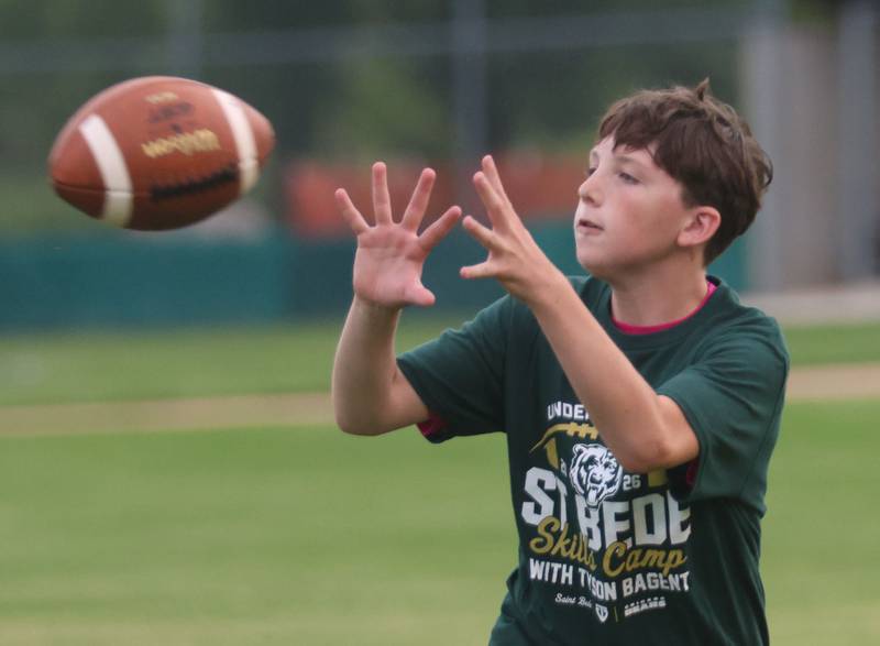 Cullen Johnston of Princeton, catches a pass during the Tyson Bagent Offensive Skills Camp on Saturday, May 23, 2026 at St Bede Academy.