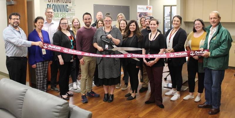 The DeKalb Chamber of Commerce welcoming Birth to Five Illinois with a ribbon cutting.