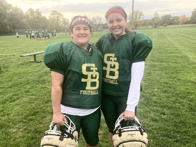 Sophomore Ruby Michels (left) and senior Marly Tillman give the St. Bede football some girl power this fall. Freshman Chloe Burgess is also out for the team.
