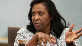 Fed official sues Trump over attempt to fire her, challenging his power over the independent agency