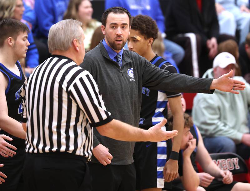 Hinckley-Big Rock head basketball coach Seth Sanderson wants a goal tending call against Marquette Tuesday, March 3, 2026, during their sectional semifinal matchup at Amboy High School.