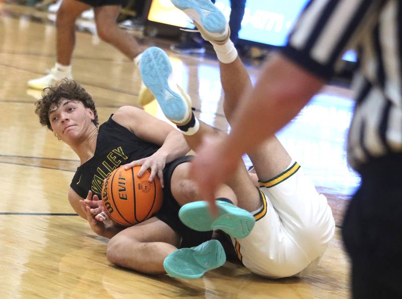 Waubonsie Valley’s Tyus Payne looks for an option against Crystal Lake South during Hinkle Holiday Classic varsity boys basketball tournament title game action on Friday, Dec. 27, 2024 at Jacobs High School in Algonquin.