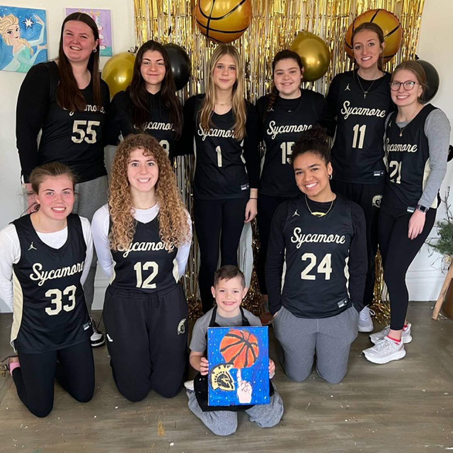 Sycamore schoolchildren recently enjoyed a Kids Painting Party at Chelsea McGhee art studios to help cheer on the Sycamore girls varsity basketball team during its spring 2024 season. Members of the team also attended.
