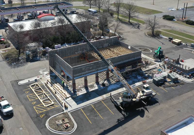 Crews work on moving materials in place on the site of a future Chipotle Mexican Grill on Wednesday, March 18, 2026 in Ottawa. The Ottawa City Council approved the project last June, and the construction has been ramping up this month. It is located on Etna Road next to Thorntons.