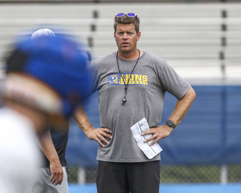 Head coach Jon Beutjer watches the offense at Lyons football practice, Monday, Aug 18, 2025  in Western Springs.