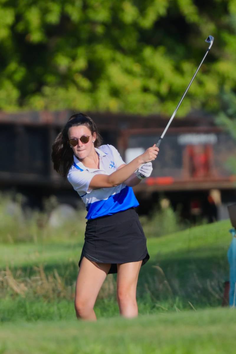 Princeton's Morgan Forristall watches her iron shot Thursday a Wyaton Hills.