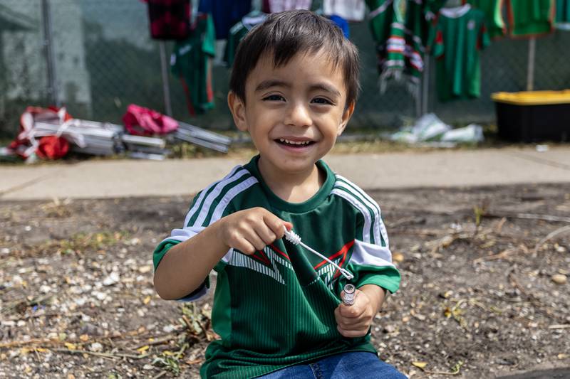 Tadeo Jauregui blows bubbles while enjoying the City of Joliet Fiestas Patrias Mexican Independence Day Parade on Sept. 13, 2025.