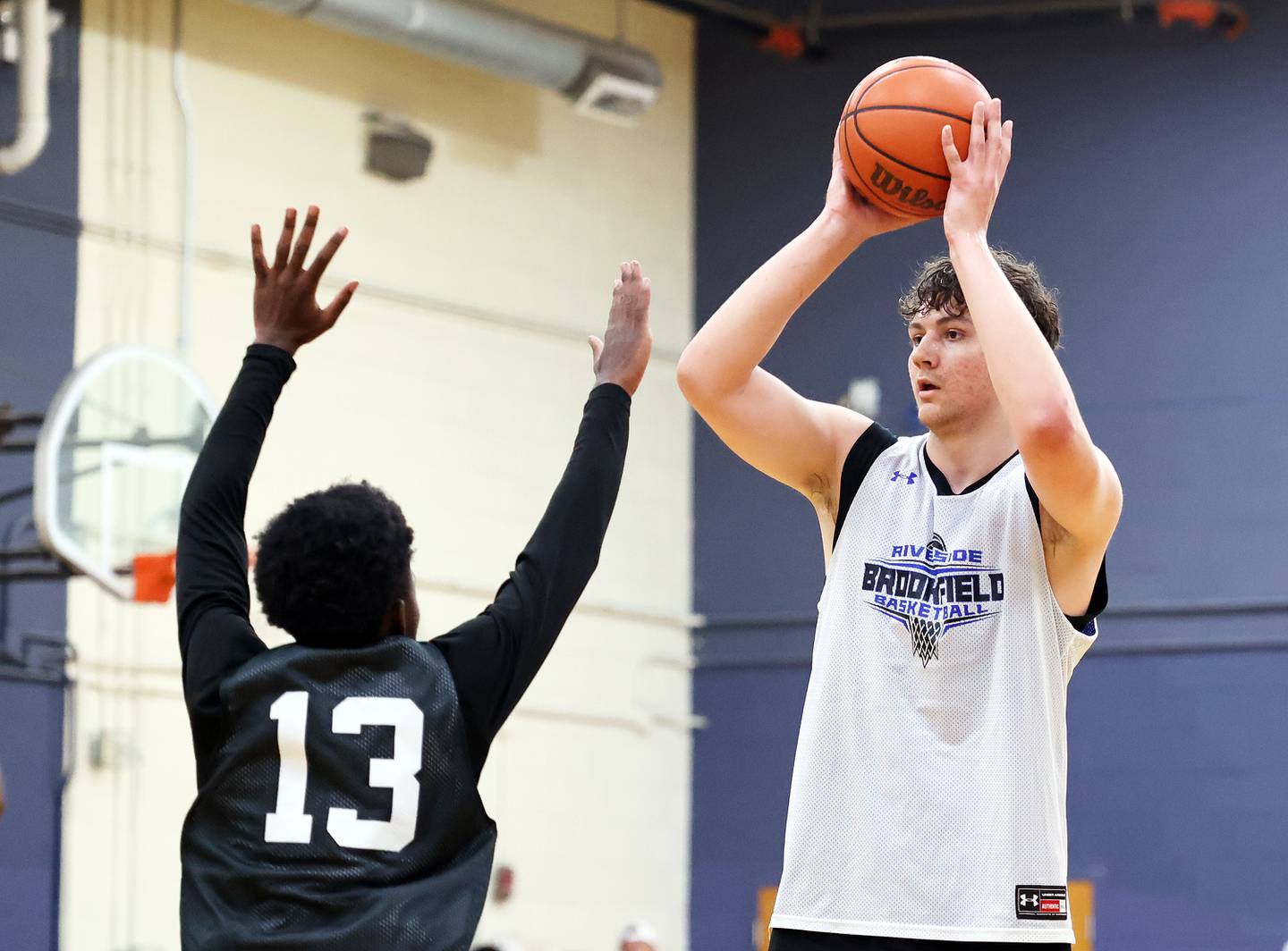Riverside Brookfield's Stefan Cicic looks for an outlet against Morton during the Riverside Brookfield Shootout for boys varsity basketball in Riverside on Friday, June 16, 2023.