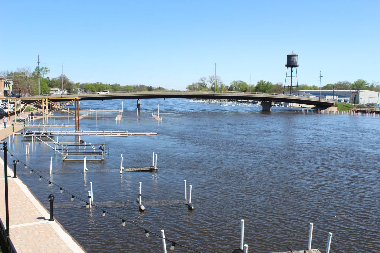 Some docks remain partially submerged along the Fox River in McHenry on April 25, 2026.
