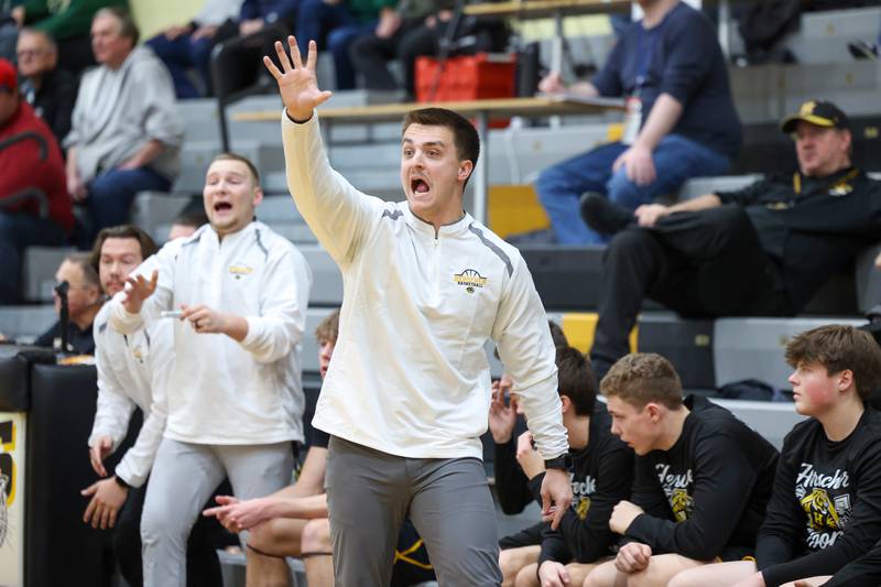 Herscher head coach Drew Boudreau calls out a play during the Tigers'  71-42 loss to Bishop McNamara in the IHSA Class 2A Herscher Regional semifinal on Wednesday, Feb. 25, 2026.