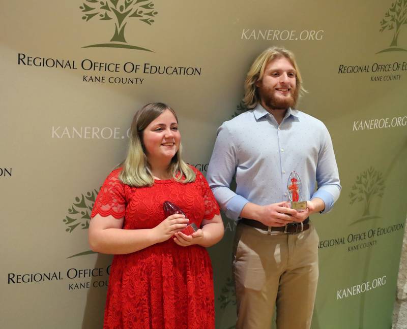 Adara Nahornoff and Titus Lands of Jacobs High School pose with their first-place awards at the Kane County ROE Photo Contest awards ceremony on December 7, 2022.
