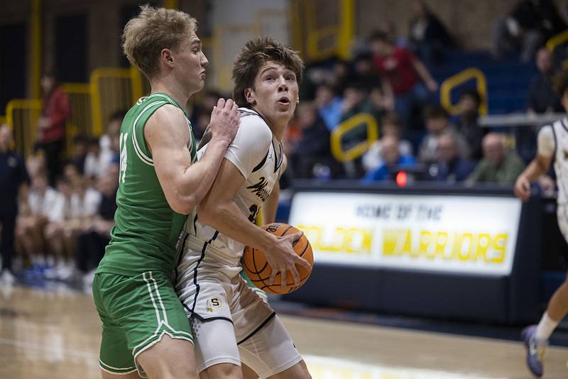 Sterling’s Jack Saathoff works against Geneseo’s Jack Kreiss Friday, Dec. 5, 2025.