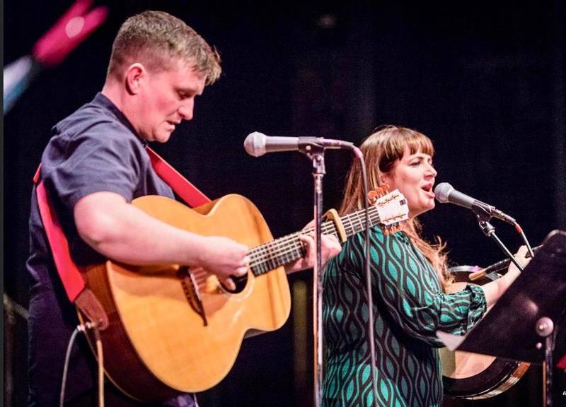 Irish singer-songwriter Aoife Scott (right) will perform along with Dublin guitarist Andrew Meaney (left) on Tuesday at the University of St. Francis in Joliet. Scott and Meaney are seen performing at the Rialto Square Theatre in March.