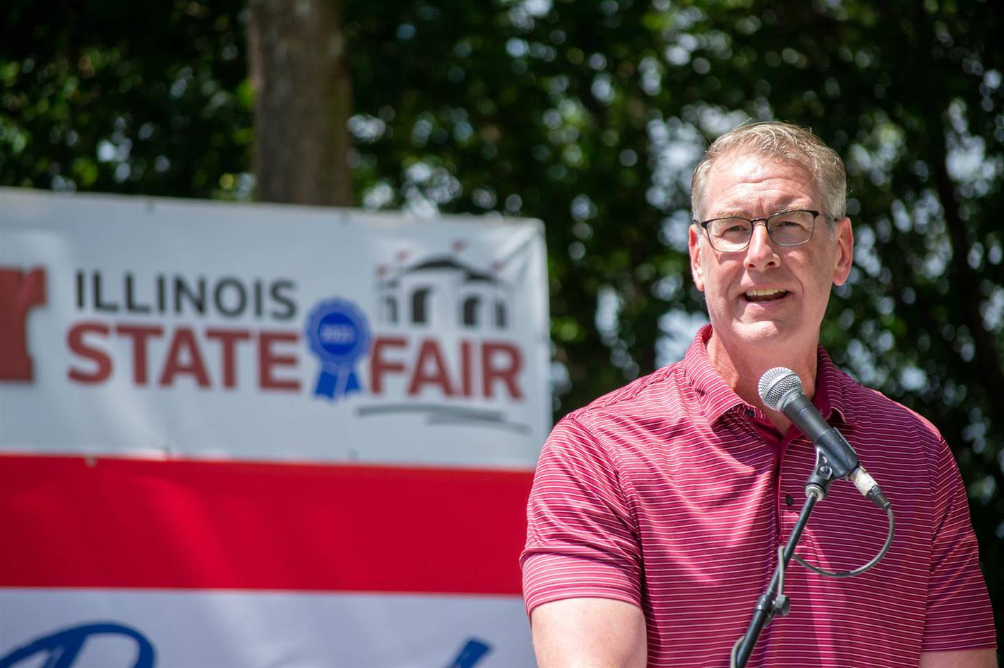 State Senate Republican Leader John Curran, of Downers Grove, speaks to the crowd during Illinois State Fair Republican Day festivities in Springfield.