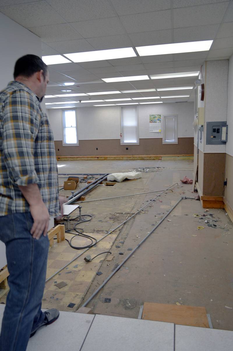 John Russell, of rural Mt. Morris, looks at the part of the former Kable News Company building's first floor addition where he plans to install a commercial kitchen on April 20, 2023. Russell closed on his purchase of the historic building on March 1; he plans to restore and modify it into multi-use space that benefits the community.