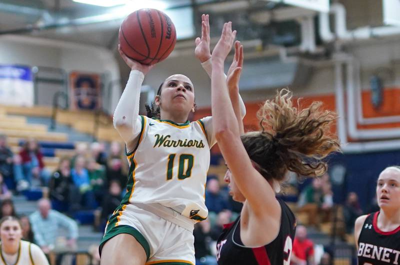 Waubonsie Valley's Danyella Mporokoso (10) shoots the ball in the post against Benet during a Class 4A Oswego Sectional final basketball game at Oswego High School on Thursday, Feb 22, 2024.