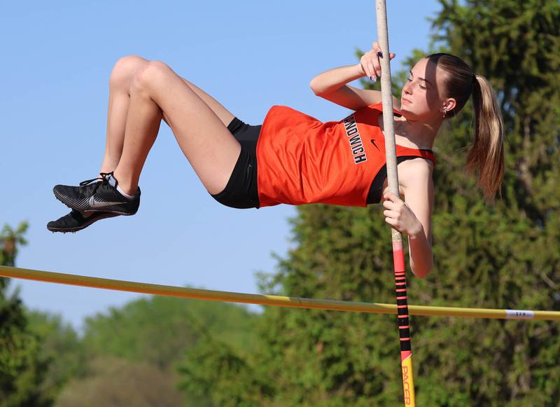 Sandwich’s Tegan Stryszyk clears the bar in the pole vault Friday, May 15, 2026, during the Class 2A girls track sectional at Genoa-Kingston High School.