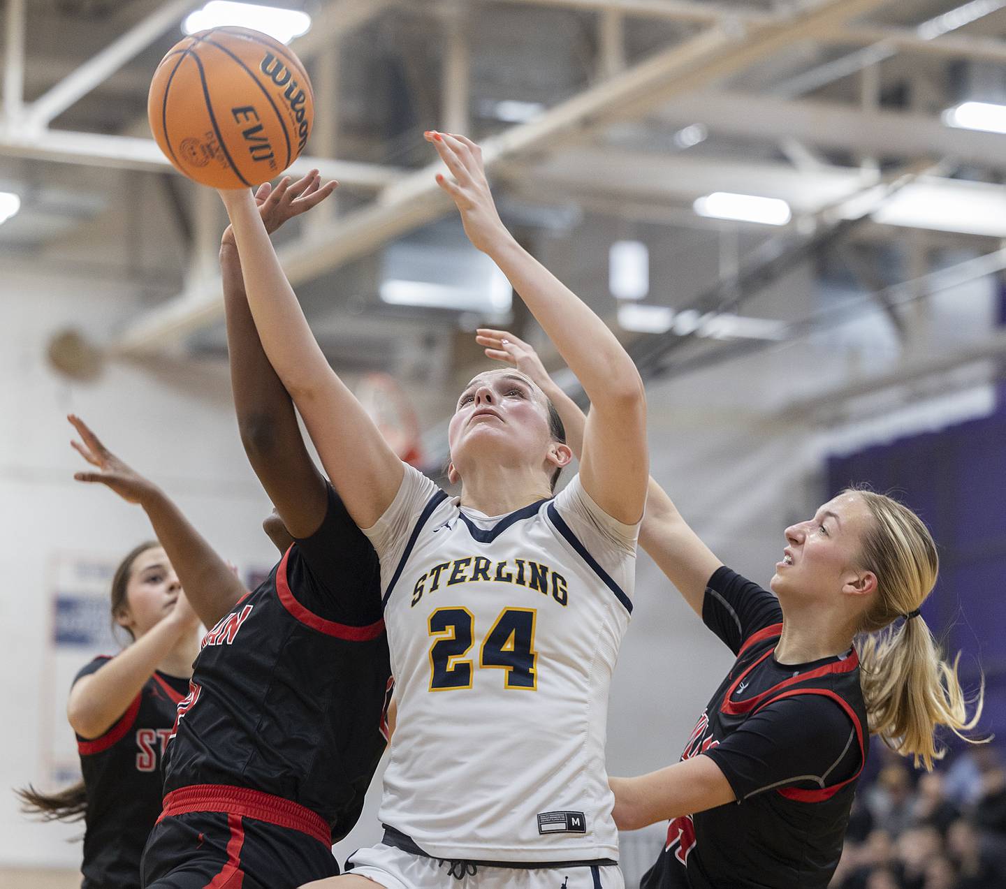 Sterling’s Madison Austin works for the ball against Stillman Valley Friday, Dec. 27, 2024, during the Dixon Girls KSB Holiday Basketball Classic.