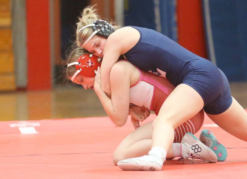 Lisle's Sophie Crescenzo wrestles Streator's Payton Henson during a meet on Wednesday, Jan. 21, 2025 in Pops Dale Gymnasium at Streator High School.