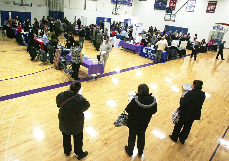 Hundreds of job seekers visited the job fair presented by McHenry County College and the McHenry County Workforce Network Job Fair Friday, April 19, 2013.