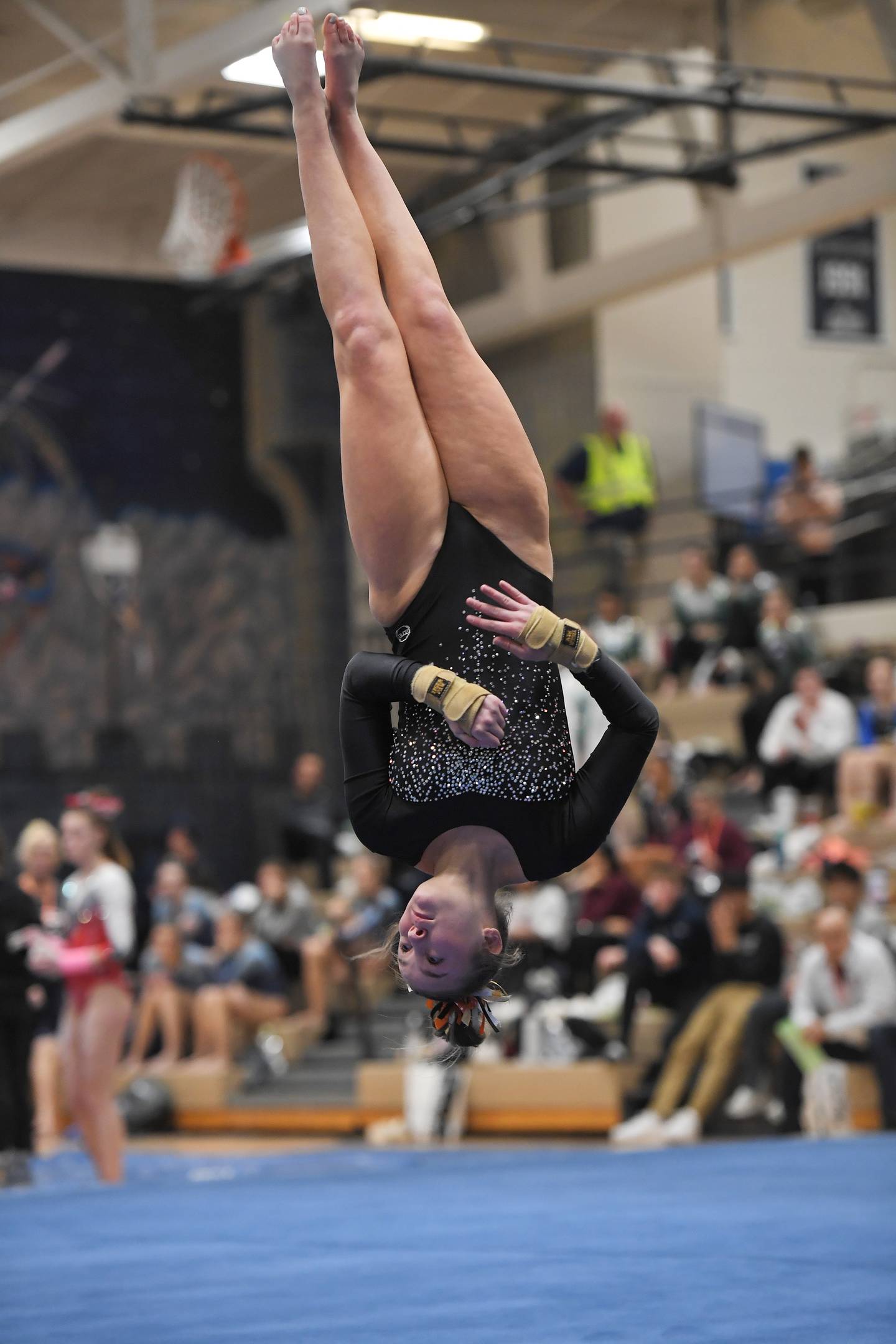 DeKalb’s Molly Kuntzi performs her floor exercise routine at the Lake Park girls gymnastics sectional meet in Roselle on Monday, February 6, 2023.