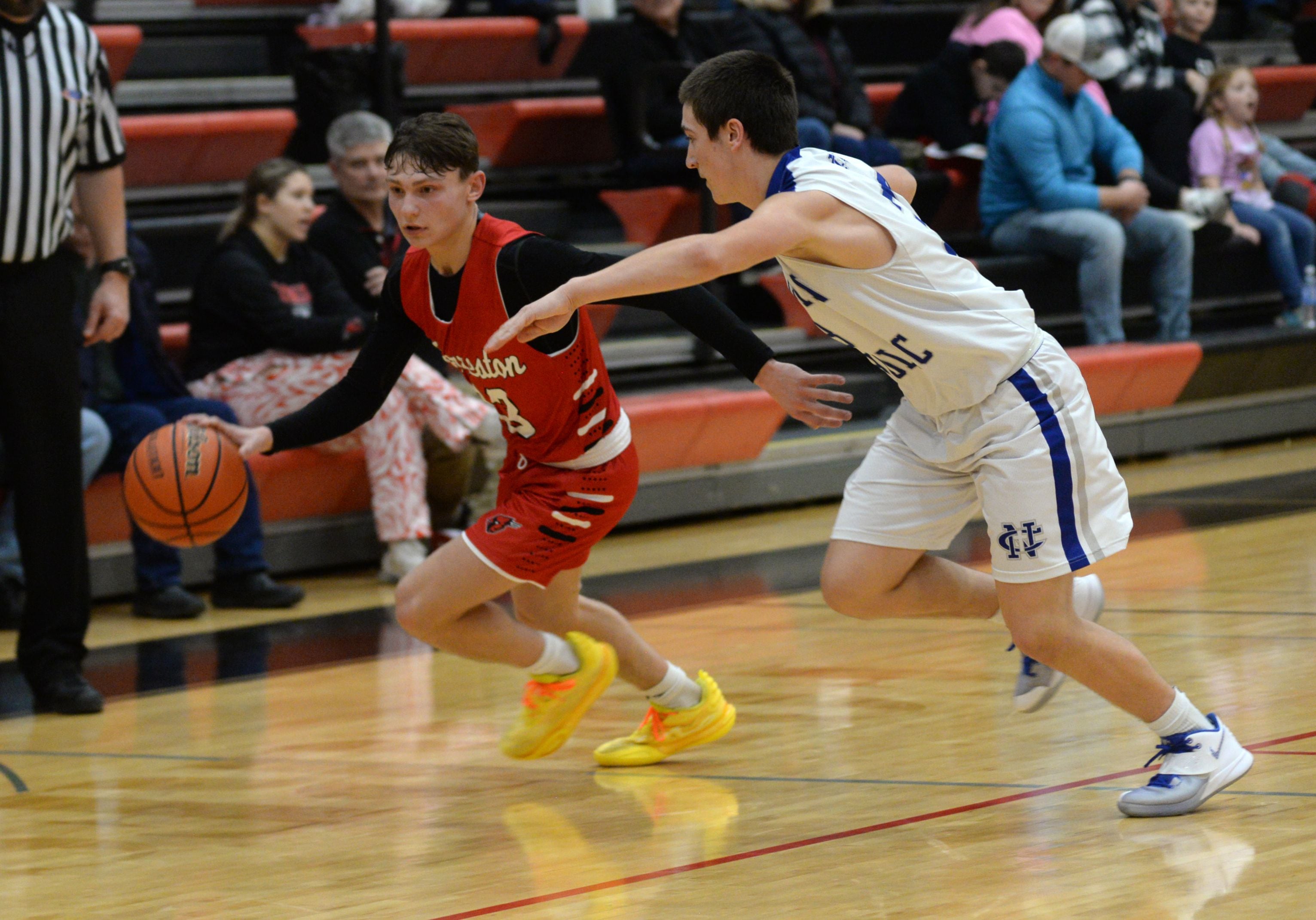 Forreston's Kendall Edrmann brings the ball up court against Sterling Newman at the 62nd Forreston Holiday Tournament on Saturday, Dec. 16, 2023.