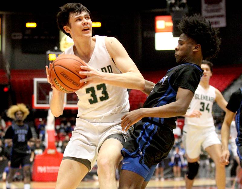 Glenbard West’s Bobby Durkin looks for his shot during a Class 4A DeKalb Supersectional game against Larkin at the Northern Illinois University Convocation Center on Monday, March 7, 2022.
