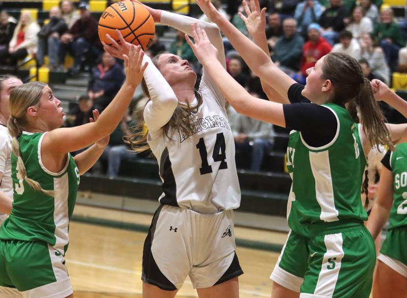 Kaneland’s Grace Brunscheen works under the net in IHSA Class 3A Regional Title Game girls basketball action on Friday, Feb. 21, 2025, at Crystal Lake South High School in Crystal Lake.