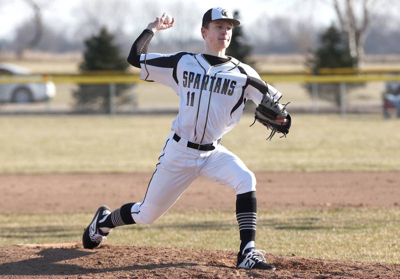 Sycamore pitcher Teague Hallahan delivers a pitch during their game against Harlem Monday, March 27, 2023, at the Sycamore Community Park.