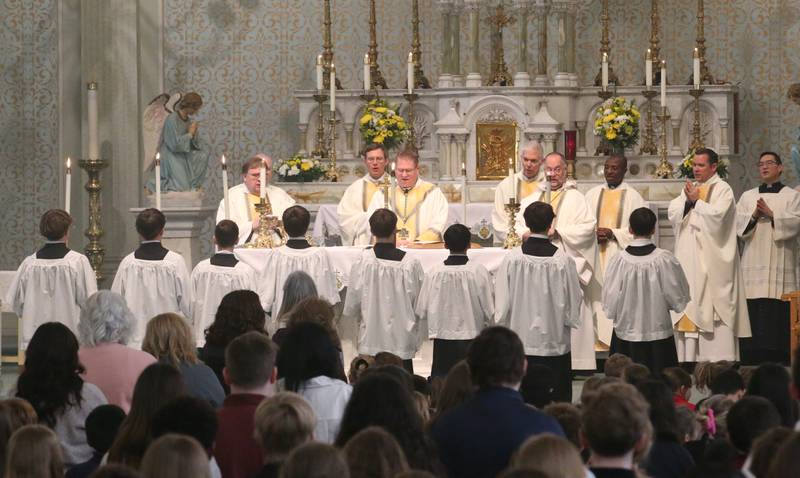 The Most Reverend Bishop Louis Tylka, Bishop of Peoria, and other clergy give Mass to students from Trinity Catholic, Oglesby Holy Family and Peru Catholic Schools during a All Schools Mass on Thursday, Feb. 20, 2025 at St. Patrick's Catholic Church in La Salle. The bishop announced a new name for the three schools calling it Carlo Acutis. Last year, the Catholic Diocese of Peoria announced the consolidation of the three schools. Carlo Acutis Canonization will take place on Sunday, April 27, 2025 during the Jubilee of Teenagers in Rome. Acutis is the first millennial saint, representing those born between the early 1980's and the late 1990's. He is celebrated for cataloging miracles and online and managing websites for Catholic organizations.