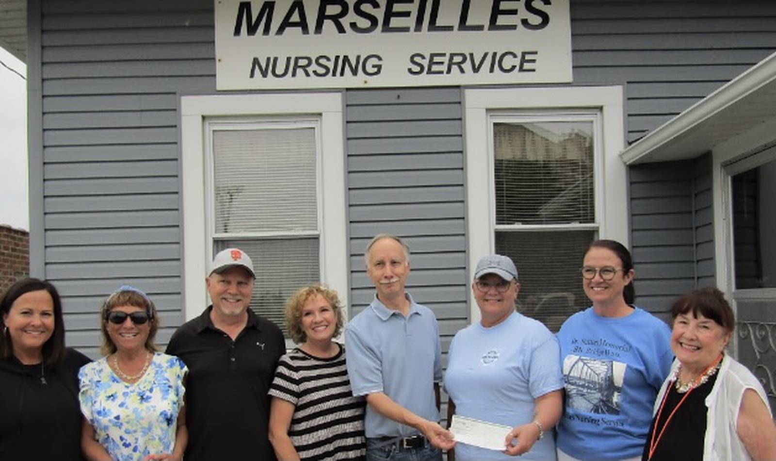 Photo Sutton family donates 10,000 to Marseilles Nursing Service