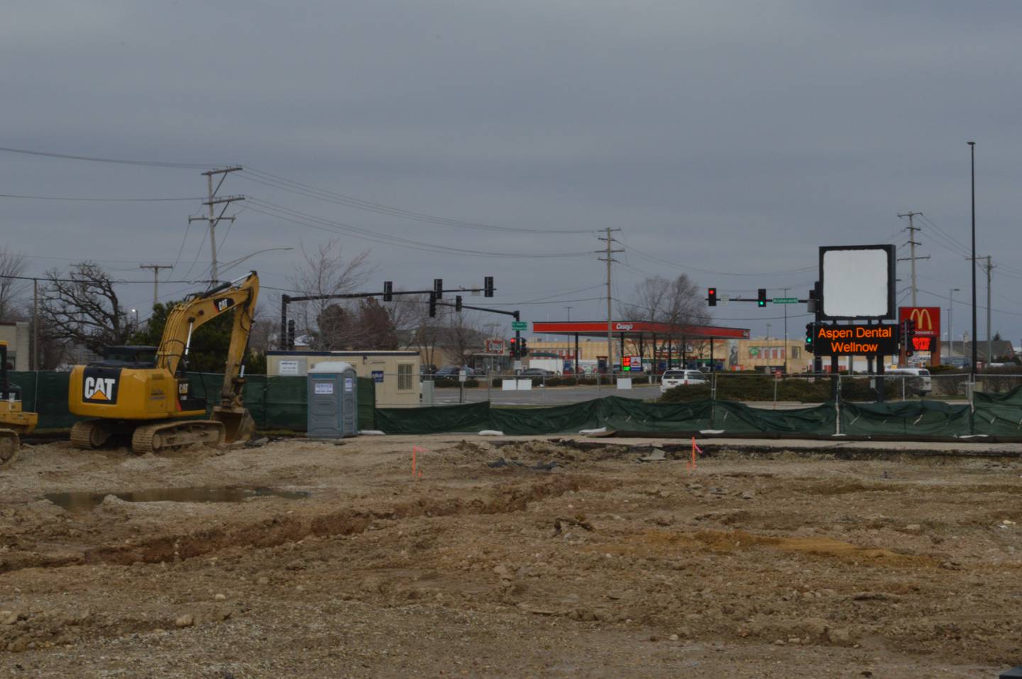 Work has begun to prepare for construction of new dental and health care office spaces and a drive-through restaurant structure in front of the former Stock and Field retailer, which is adjacent to a separate section of the McHenry Plaza commercial center that was just bought for $2.3 million by a new owner that was able to lure tenants into spaces that had been vacant for years.
