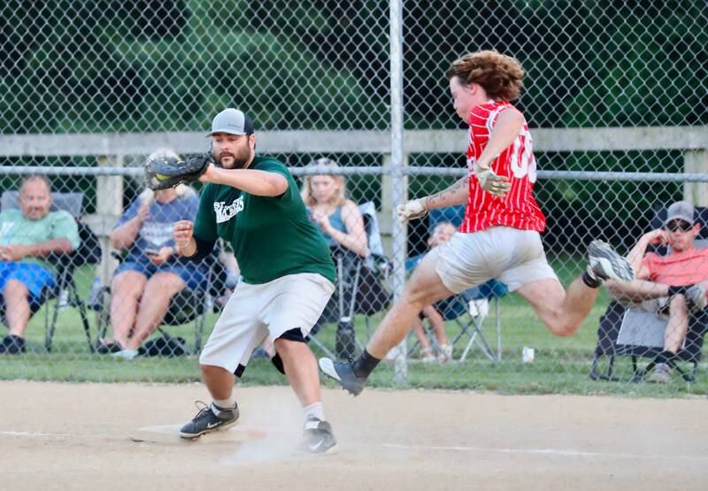 t. Matthews' Blair Bickett makes the throw at first base as Malden Methodist's Noah Atkinson leaps for the base during Princeton Fastpitch Church League championship game Friday night at Westside Park.