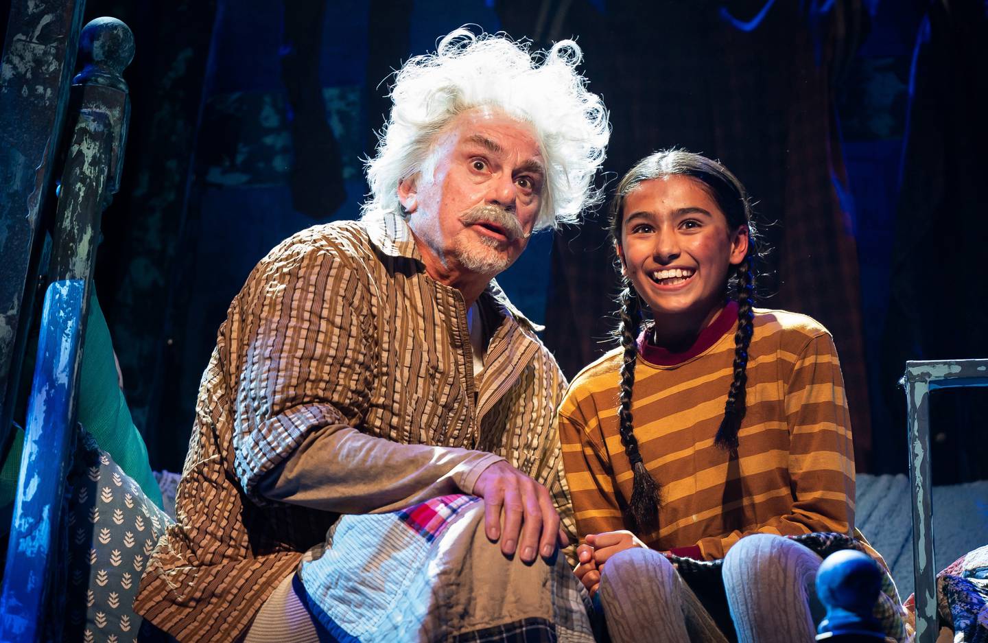 Gene Weygandt (left) plays Grandpa Joe and Meena Sood is Charlie Bucket in Paramount Theatre’s Professional Regional Premiere of Charlie and the Chocolate Factory. Performances are November 8, 2023-January 14, 2024. Trent Stork directs. For tickets and information, visit paramountaurora.com, or call (630) 896-6666. Note: Meena Sood alternates performances as Charlie Bucket with Charlie Long. Photo credit: Liz Lauren